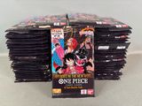 a stack of one piece cards sitting on a table
