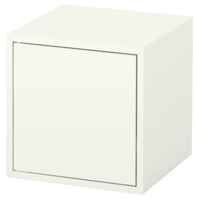 un gros plan sur une boîte blanche dont la porte est ouverte