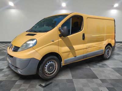 the yellow van is parked on a checkered floor in the garage
