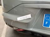 a sticker on the back of a car with a european flag on it