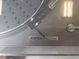 a close up of a turntable with a needle in it