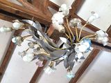 a chandelier hanging from the ceiling of a building