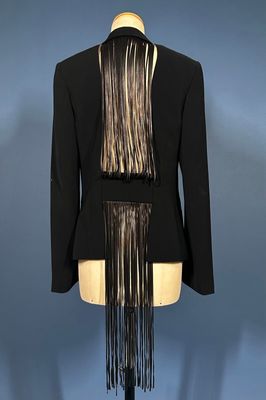 a black jacket with fringes on a mannequin mannequin mannequin mannequin mann