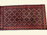 a close up of a rug on a white surface