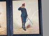 four framed pictures of men in military uniforms on a wall