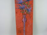 painting of a vase with purple flowers on an orange background