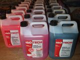 a lot of different colored liquids on a table
