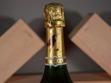 a bottle of wine that is sitting on a table