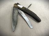 a knife that is laying on top of a table