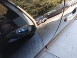a reflection of a car on the side of the road