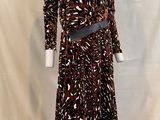an image of a woman ' s dress on a mannequin stand