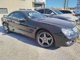 a picture of a mercedes slk parked in a parking lot