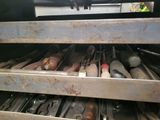 a picture of a drawer full of tools in a garage