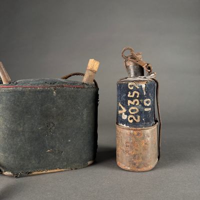 two old suitcases sitting next to each other on a table