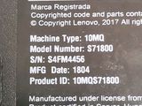 a sign on the side of a building that says lenovo