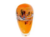 a glass vase with a picture of a beach scene on it