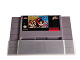 a nintendo game sitting on top of a nintendo game console