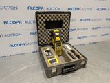 an open case with tools in it sitting on a table