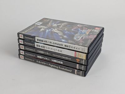 four dvds stacked on top of each other on a table