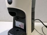a coffee maker that is sitting on a table