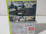 a close up of a video game case on a white surface