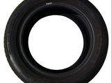 a tire with a black rim on a white background