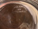 a close up of a glass with a liquid inside of it