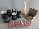 a lot of candles that are sitting on a table