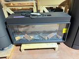 une photo d'un aquarium contenant des rochers