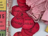 a lot of red and yellow tags on a table