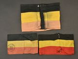 pair of men ' s swim trunks with zippers on the sides