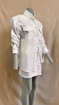 an image of a mannequin dressed in a white shirt and skirt