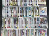 a large collection of card games on a table