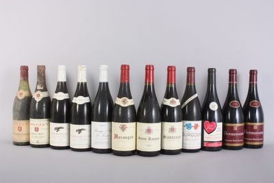 several bottles of wine are lined up in a row on a table
