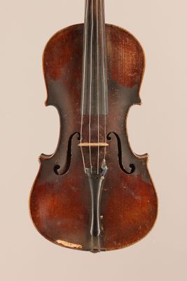 an old violin with a wooden case and bow on a white background