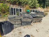 a pile of rocks sitting on the side of the road