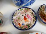 a lot of plates that are sitting on a table