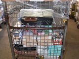 a shopping cart with many items in it in a warehouse
