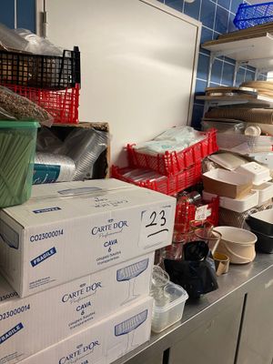 many boxes of food on the counter in the kitchen