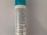 an image of a bottle of deodoranant sitting on a table