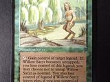 a close up of a card with a picture of a man in a forest