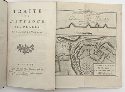 an open book with a map of a town on it