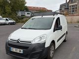 a white van that is parked in a parking lot