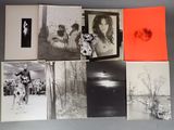 several black and white photographs of a woman and a man and a dog