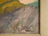 a painting of a landscape in a frame on the wall