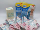 a package of toothpaste and toothbrushes on a table