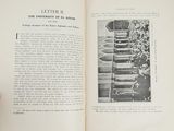 a person holding a book open to a page with a picture on it