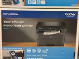 three new brother printers are on display in a store
