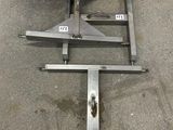 a picture of a metal stand that is on the ground