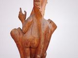statue of a horse with a bird on its back